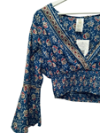 Conjunto de blusa fruncida y falda pantalon