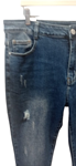 Pantalones vaqueros con rotos.