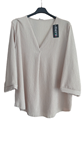Blusa talla grande cuello de pico