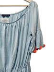 Blusa manga corta con pompones