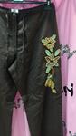 Pantalones de raso brillantes, negros con detalle de flores