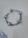 Pulsera edición limitada, canalizacióny bolas plateadas
