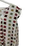 Blusa acampanada sin mangas