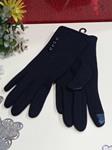 Guantes de mujer con colores lisos, detalle botones. Es táctil