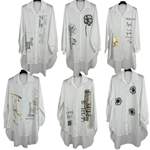Blusón camisero blanco con dibujos discretos