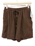 Short liso con bolsillos
