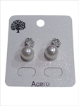 Pendientes con perla colgando, contraste plateado