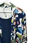 Conjunto versatil de blusa tipo chaqueta y pantalon