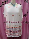 Blusa "Criolla" blanca, con bordados de inspiración étnica