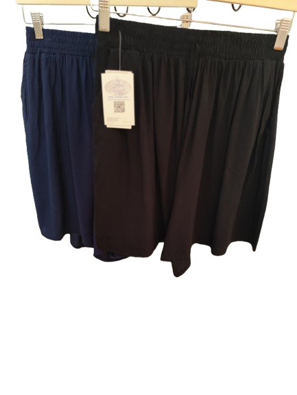 Short mujer veraniego, amplio monocolor