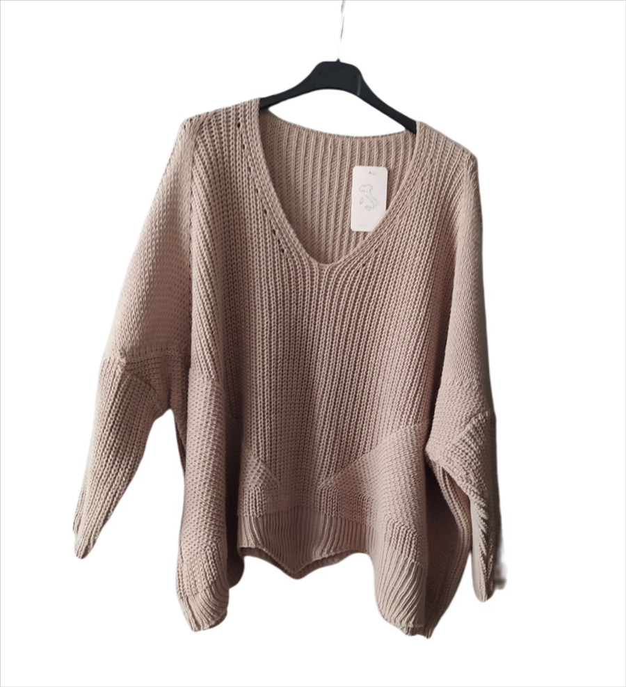 Jersey oversize beig, con bajo desigual