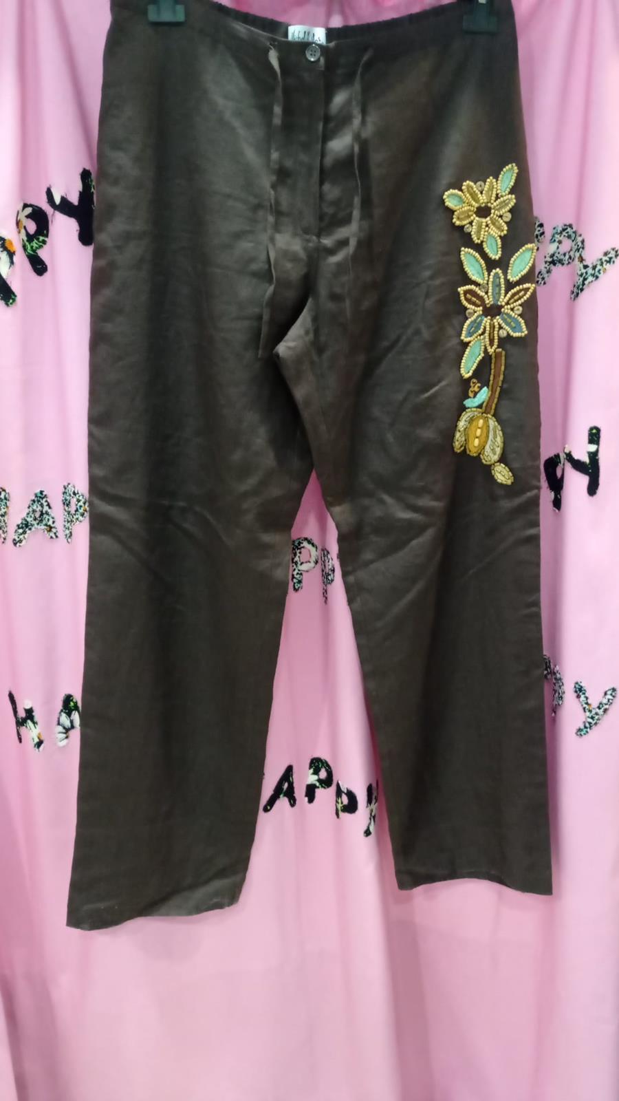 Pantalones de raso brillantes, negros con detalle de flores