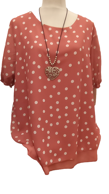 Blusa de manga corta malva con topos blancos