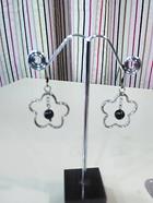 Pendientes "Silueta flor" | 008290 | Ropa y complementos para todas, tallas grandes, moda casual, elegante y cómoda.