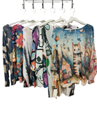 Jersey manga larga tipo murciélago estampado con dibujos | 55-6-076-13-1690 | Ropa y complementos para todas, tallas grandes, moda casual, elegante y cómoda.